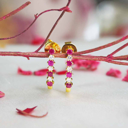 Aasma Ruby Earrings in gold with deep red ruby gemstones